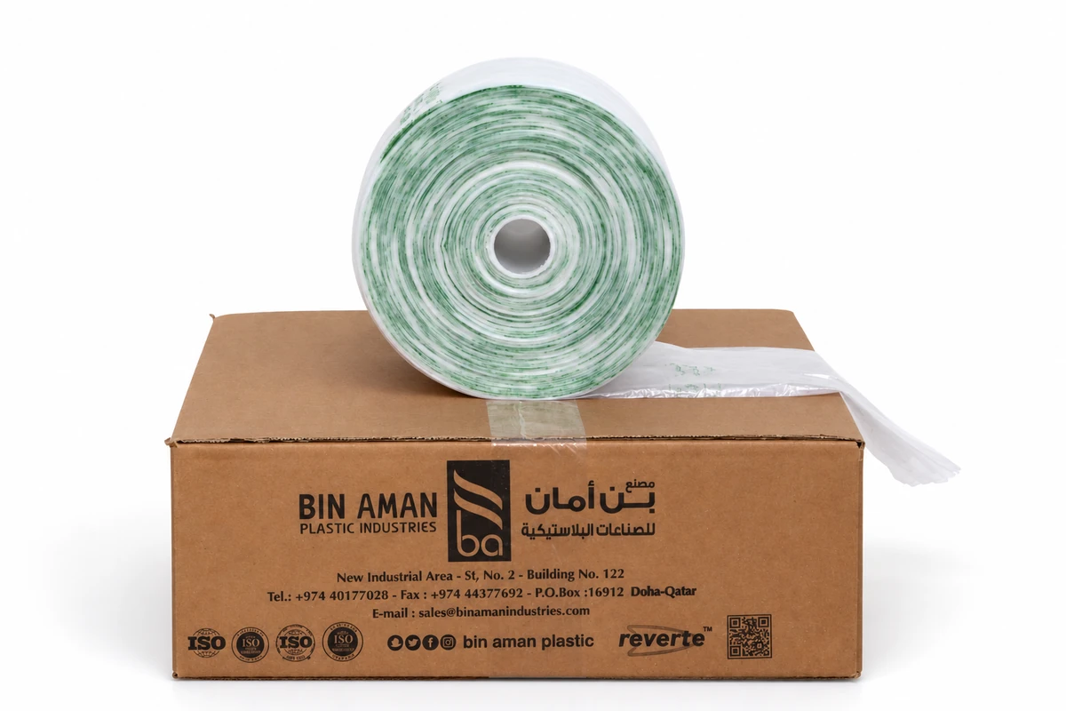 Roll of translucent packaging bags on a Bin Aman cardboard box