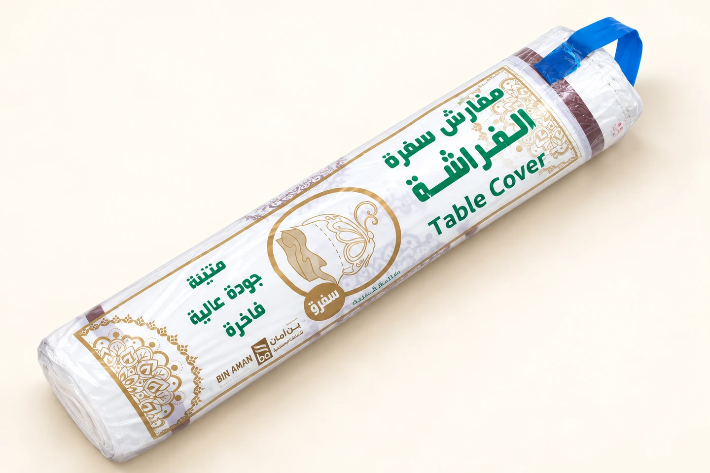 Wrapped table-cover roll with green printing and a blue carrying handle