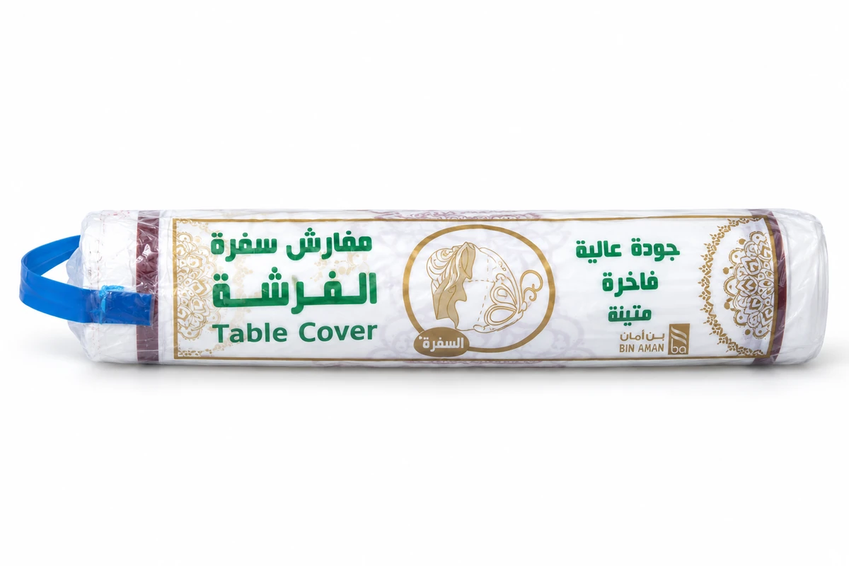 Packaged roll of table covers with a blue carrying handle